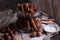 Cinnamon sticks in transparent glass jar.