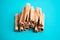 Cinnamon sticks on the turquois background, back view