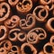 Cinnamon swirls background, top view