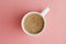 Cinnamons powdered coffee, capuchino coffee cup isolated on pink or coral background. Top view