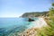 Cinque Terre: View to Monterosso al Mare beach from the Vernazza hiking trail in early summer, Liguria Italy