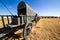 Circle of 64 replica Voortrekker wagons cast in bronze at Blood River Heritage Site, KwaZulu-Natal, South Africa