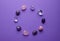 The circle is lined with natural minerals. Semi-precious stones of different colors processed. Amethyst and rose quartz. Frame of