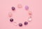 The circle is lined with natural minerals. Semi-precious stones of different colors processed. Amethyst and rose quartz. Frame of