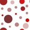 Circles of different diameters and shades of red vector seamless pattern