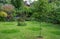 Circles of grass are left uncut in a suburban garden in Pinner, northwest London, UK to attract wildlife.