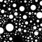 Circles pattern - Monochrome black and white pattern with scattered, random varying circles. Irregular dotted, speckles pattern