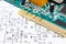 Circuit board with transistors, resistors, capacitor. Diagram of electronics