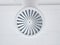 Circular Air Conditioning Grille on White Colored Ceiling