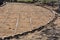 A circular backyard patio is ready for concrete as the forms and connecting rods are in place,