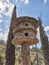 Circular bird nest made of stone with two entrances