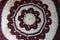 Circular brown and white crochet pattern for handmade pillow