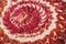 Circular decorative arrangement of iberian cured ham on plate