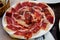 Circular dish with JamÃ³n ibÃ©rico - Image - Photo