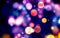 Circular dots of various colors with blurred background.