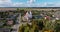 circular flight and aerial panoramic view overlooking old historic building medieval church in village