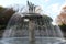 Circular fountain with statues in Showa Memorial Park