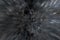 Circular geometric dark silver gray black background. Abstract explosion effect. Centric motion pattern. Warp drive