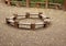 Circular grouping of benches around fire pit