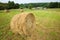 A circular haystack and farm on Blue Ridge Highway in North Carolina