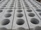 Circular hole on white brick, The rough and porous texture of the gray building materials,