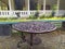 circular iron table in the garden