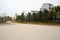 Circular path and flagstone square outside apartments in sunny w