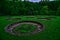 Circular ponds within Backbone State Park in Iowa part of a former fish hatchery.