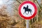 Circular Road Sign Saying that Horseback Riding is Prohibited