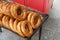 Circular sesame bread Turkish style called as Simit on street food shop in Turkish. Round sesame bread on tray