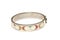 A circular stainless steel latch locking bracelet bangle