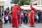 Circus red staff on stilts