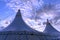 Circus tent with two towers. Big Top Circus. The image of a circus on a background of blue sky