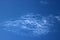 Cirrocumulus clouds seen against blue sky