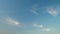 Cirrostratus clouds flying slowly on beautiful blue sky horizon background.