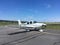 Cirrus aircraft on apron of small airport