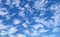 Cirrus clouds high in the blue sky