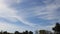 Cirrus clouds moving in blue sky