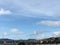 Cirrus clouds over San Francisco`s Twin Peaks, with Sutro Tower.