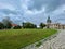 Cistercian state monastery Osek, Ossegg front church, Czech Republic. A rose hip bush