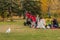 Citizens relax in the Princes Island Park in autumn. Downtown Calgary