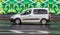 Citroen Berlingo Second generation B9 car drive on the city road. Fast moving white commercial van