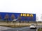Citroen car driving fast highway entrance with IKEA store