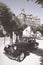 Citroen traction avant parked near a medieval castle in Estaing, France