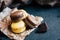 Citron and chocolate macaroons on a black slate