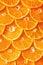 Citrus background. Lemon, orange lime, grapefruit mandarin. Harvest concept. Top view. Tangerine segments, orange background