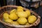 Citrus Delights: Basket of Fresh Lemons Brimming with Mediterranean Flavors in Ravello, Amalfi Coast