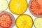 Citrus slices. Citrus fruits oranges lemons food background portrait format collection collage set fruit backgrounds