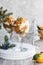 Citrus trifle with fresh tangerines. Christmas portioned dessert on the festive table