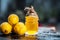 Citrus Ã— limon,Lemon with lemon oil in a transparent bottle.Concept of skin
